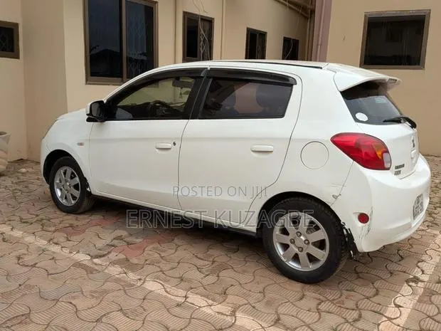 Mitsubishi Mirage 2014 White · Photo 1