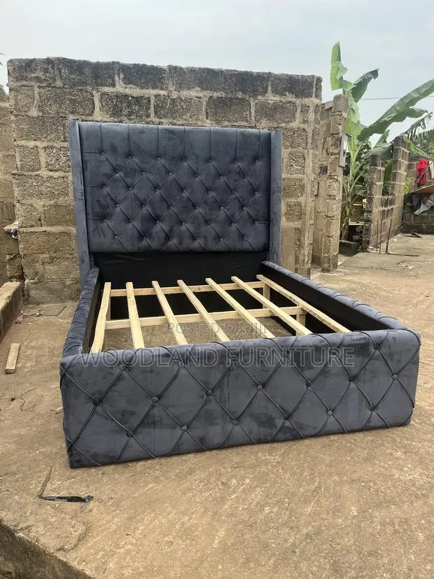 Luxurious Dark Gray Diamond Tufted Velvet Bed Frame by Woodland . · Photo 1