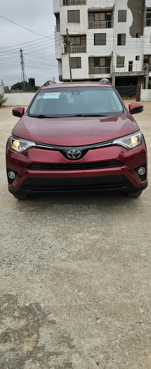 Toyota RAV4 LE 4dr SUV (2.5L 4cyl 6A) 2018 Red · Photo 1