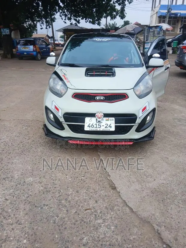 Kia Morning 2014 Burgundy · Photo 1