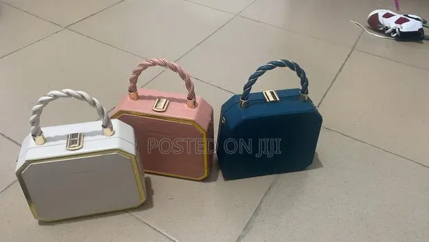 Luxury Classy Ladies Handbags With Gold-Trimmed Handles · Photo 1