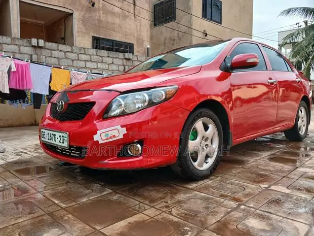 Toyota Corolla 2010 Red · Photo 1