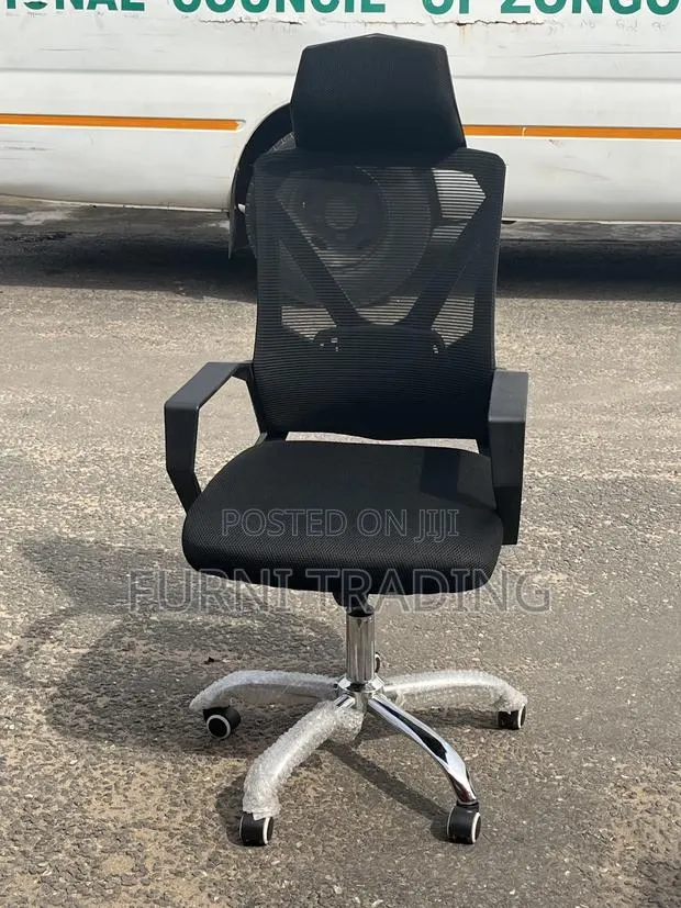 Office Swivel Chair With Headrest · Photo 1