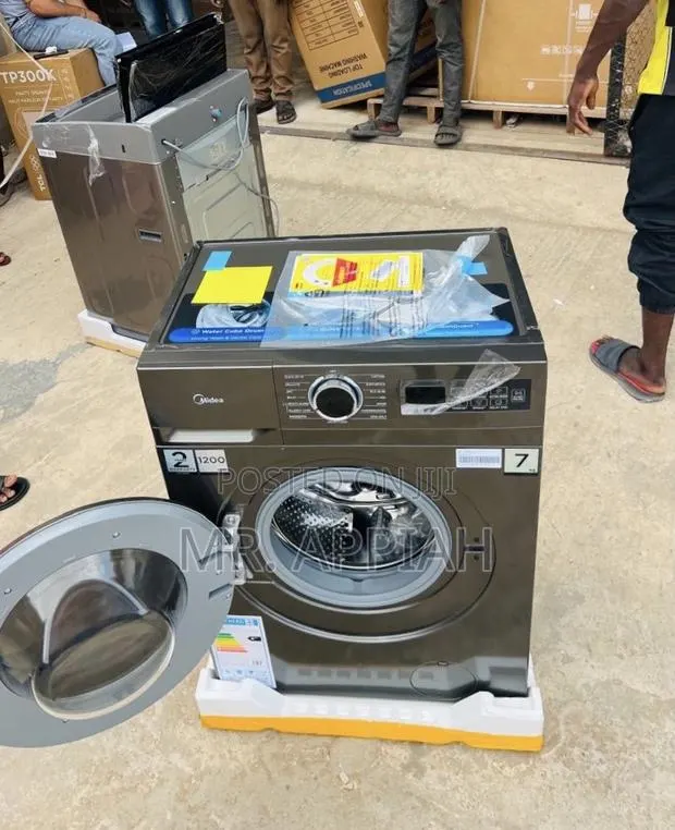 Effortless Cleaning Midea Mf110w70 Front Load Washing Machine · Photo 1