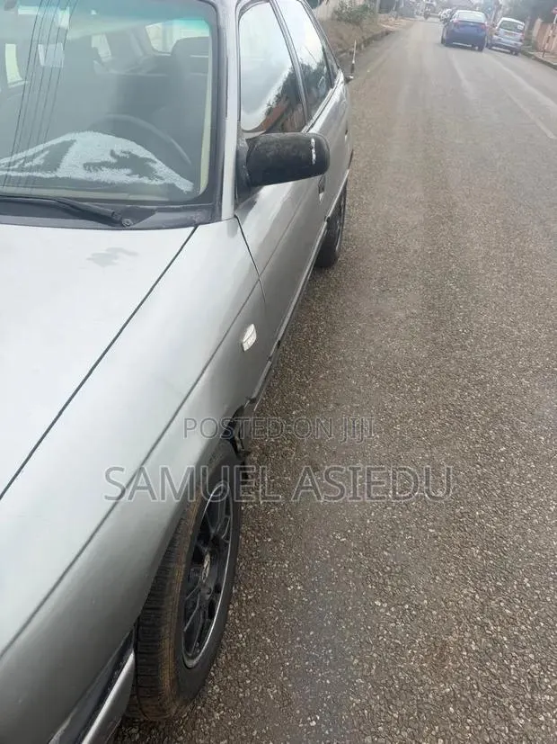 Opel Astra 1.6 Cabriolet 1996 Silver · Photo 1