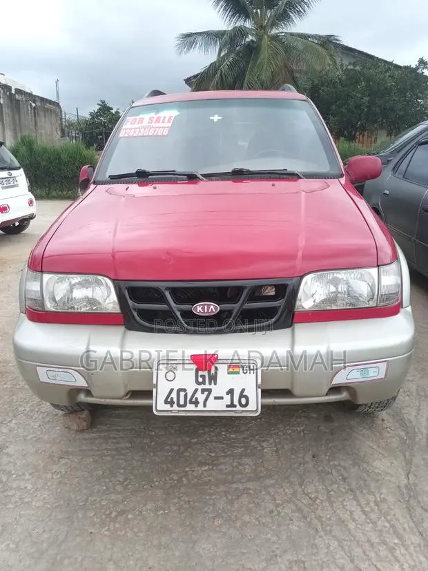 Kia Sportage 2005 Red · Photo 1