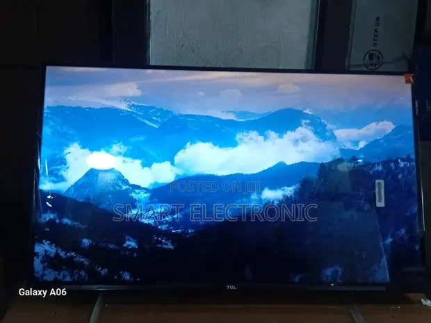 TCL 32” Television – Smart Viewing Experience · Photo 1