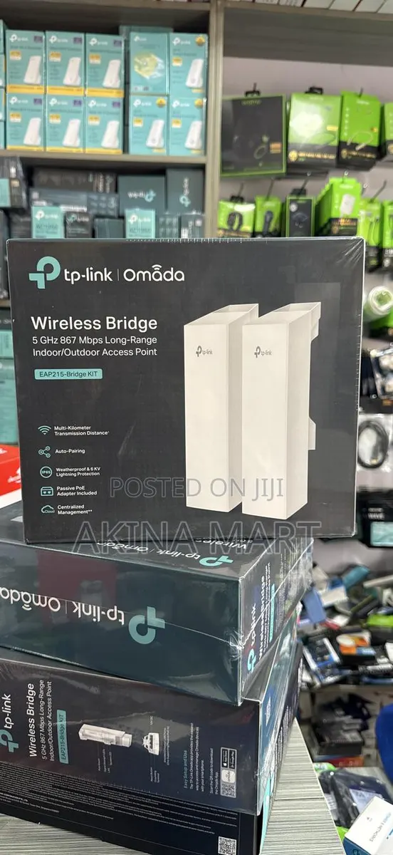 TP-Link Omada 5ghz 867mbp Long-Range Indoor/ Outdoor Eap215 Bridge Kit · Photo 1