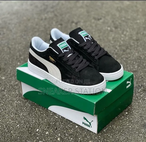 Puma Suede Black/White Available · Photo 1