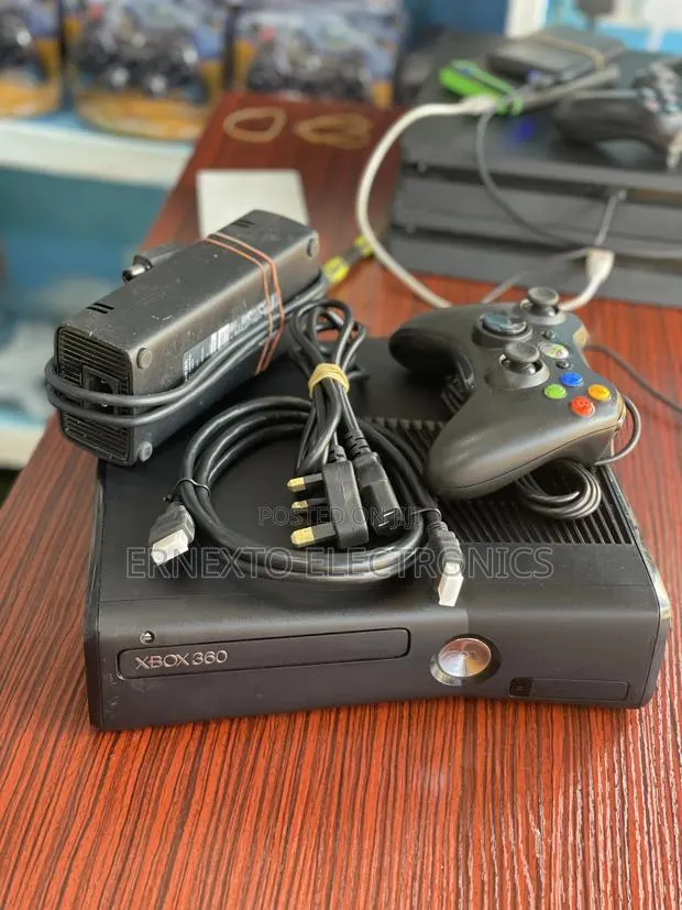 Xbox 360 Slim With 15 Games Available Tested and Confirmed · Photo 1