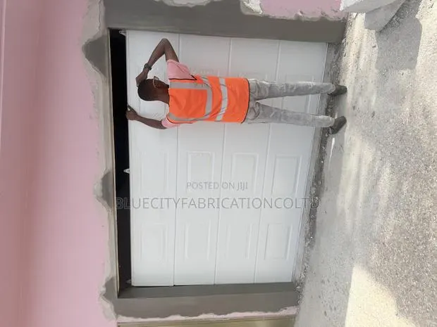 Canadian Garage Doors With Two Remote · Photo 1
