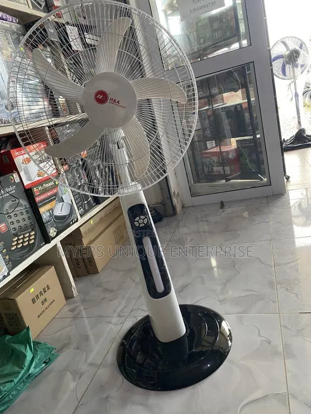 New H a 18" Rechargeable Standing Fan With Remote Control · Photo 1