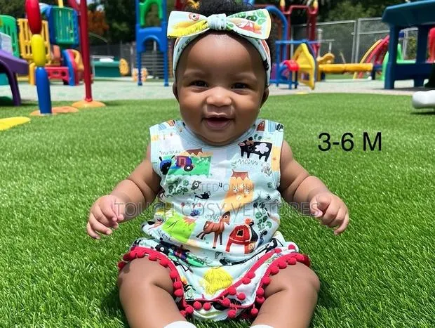 Colorful Animal Print Baby Outfit With Bow Headband (3–6 M) · Photo 1