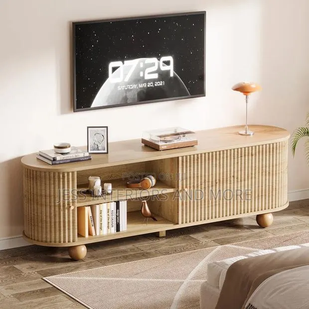 TV Stand With Sliding Door and Storage for TVs Up to 78" · Photo 1