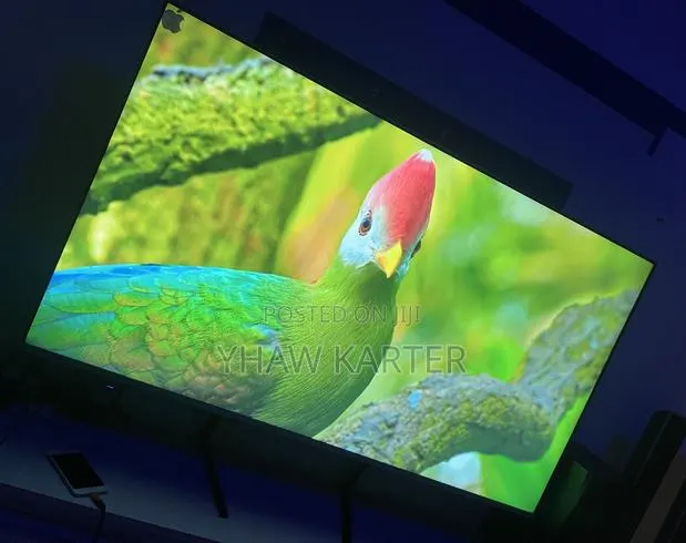 AKAI 65” Smart TV · Photo 1