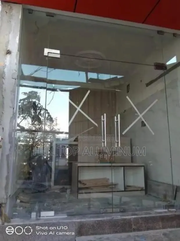 Framelezz Temperedd Glazz Doorz · Photo 1
