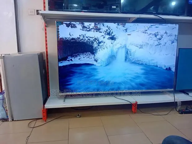 Green 75" Visionmax Tv · Photo 1