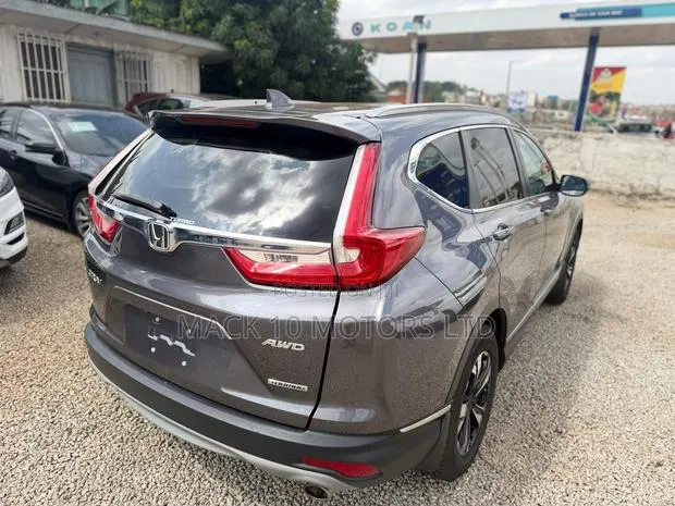 Honda CR-V Touring 4dr SUV AWD (1.5L 4cyl CVT) 2017 Gray · Photo 1
