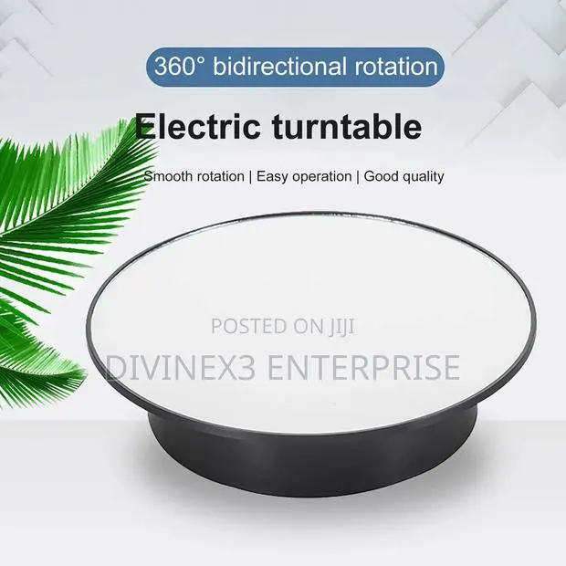 25cm 360° Electric Rotating Display Stand With Mirror · Photo 1