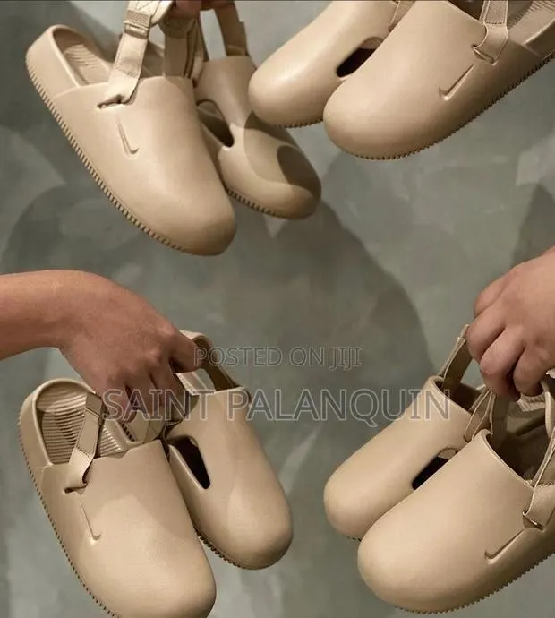 Nike Calm Mules · Photo 1