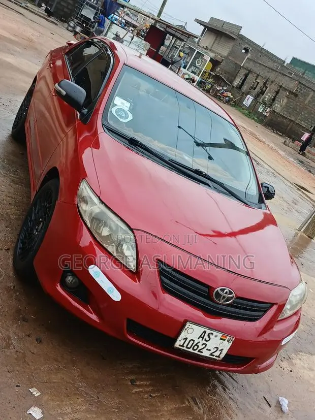 Toyota Corolla 2010 Red · Photo 1