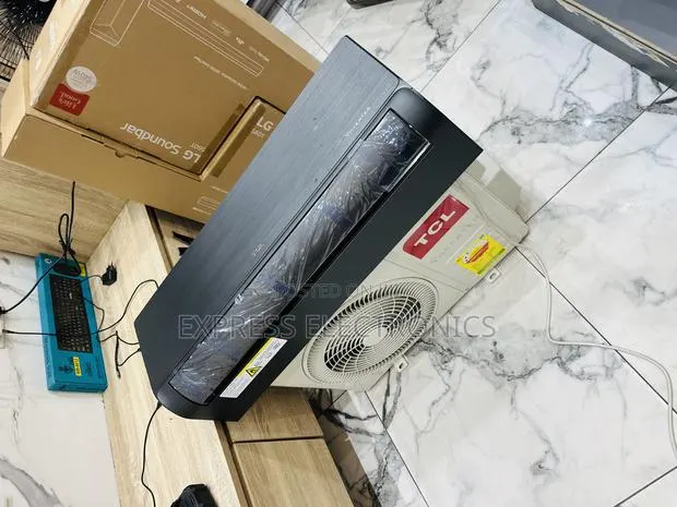 Chill Fast Sleek Air Conditioner Dark Grey Color TCL 1.5hp Inverter · Photo 1