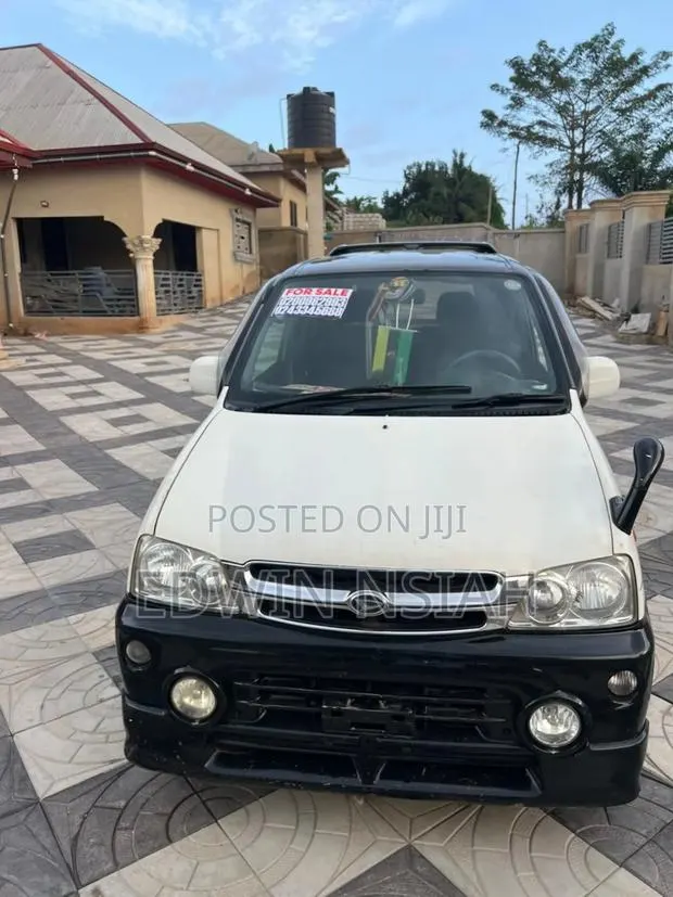Daihatsu Mira 2010 White · Photo 1