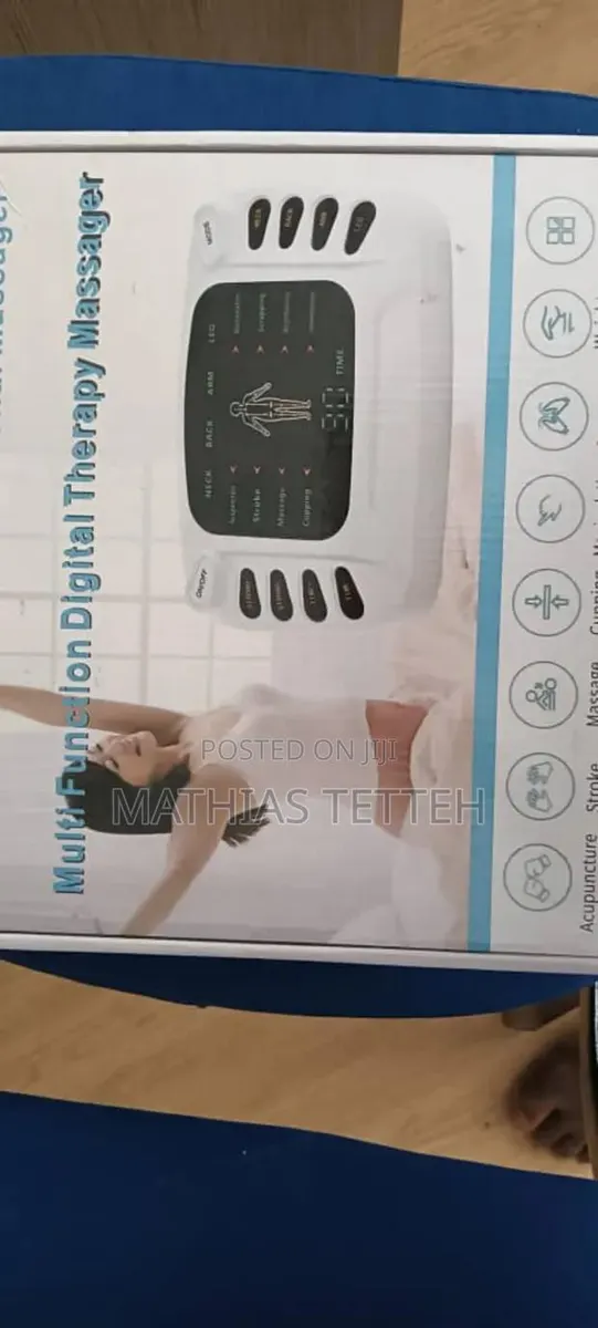Electronic Pulse Massager · Photo 1