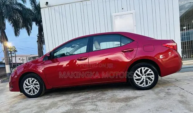 Toyota Corolla LE (1.8L 4cyl 2A) 2019 Red · Photo 1