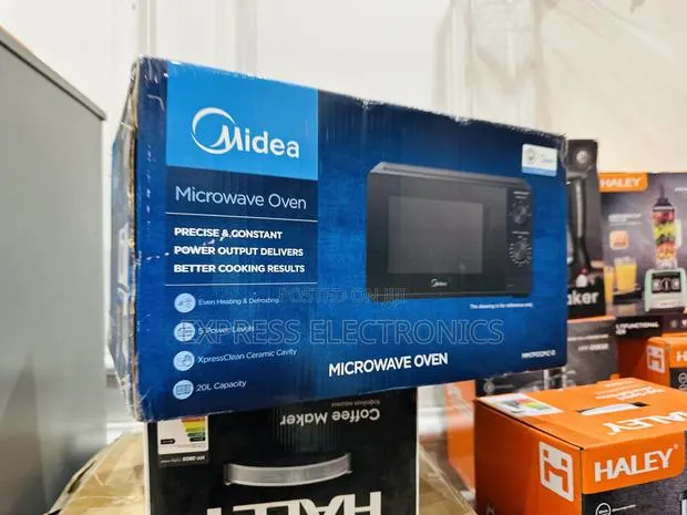 Easy to Clean Interior Microwave Midea 20l Black · Photo 1