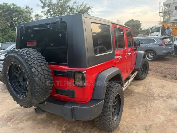 Jeep Wrangler Unlimited Sahara 4dr SUV 4WD (3.6L 6cyl 6M) 2015 Red · Photo 1