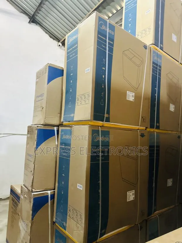 Ultra Modern Sleek White Wm Semi Automatic 7kg Midea · Photo 1