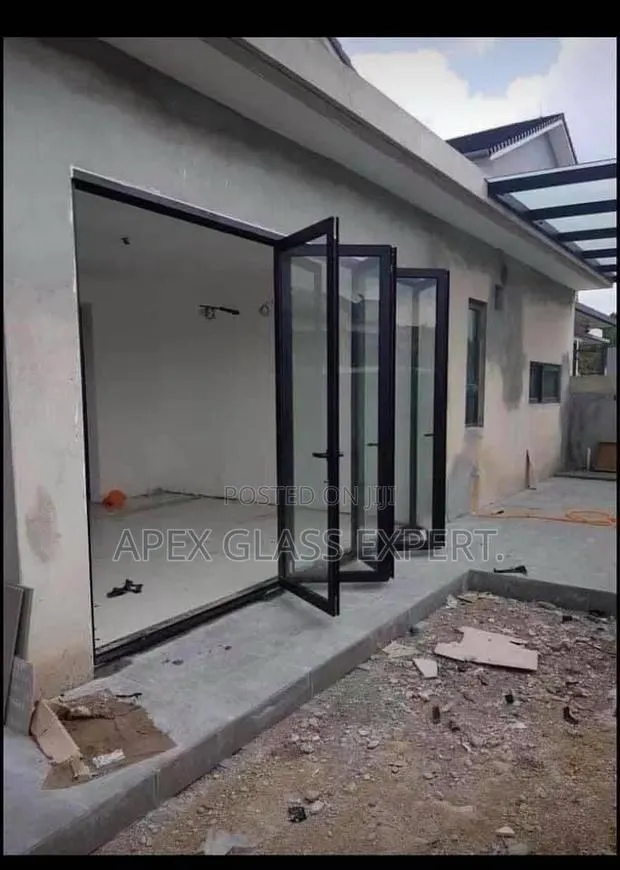 Bifold Framed Glass Door With 10mm Clear Tempered Glass. · Photo 1