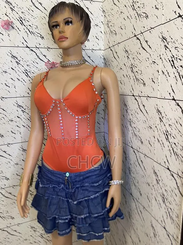Stunning Orange Rhinestone Corset Bodysuit and a Matching Mini Skirt · Photo 1