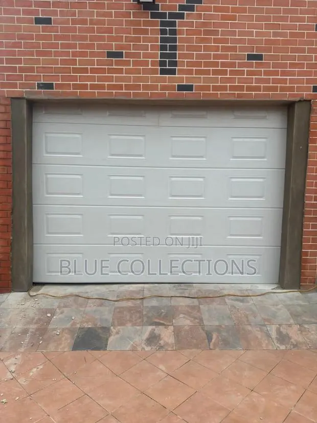Morden Automated Garage Door · Photo 1