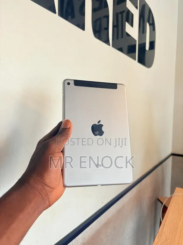 New Apple iPad 4 Wi-Fi + Cellular 64 GB Gray · Photo 1