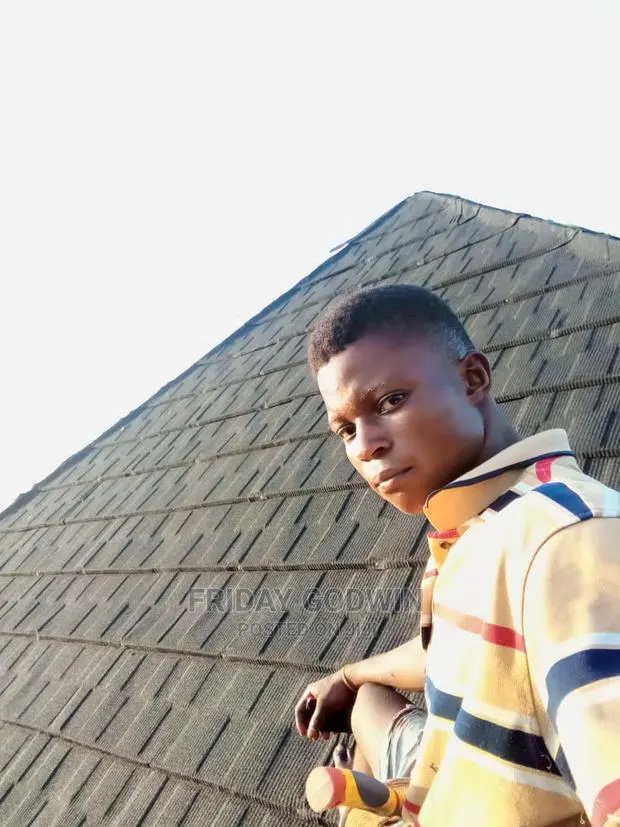 Installation of Roofing Sheet · Photo 1