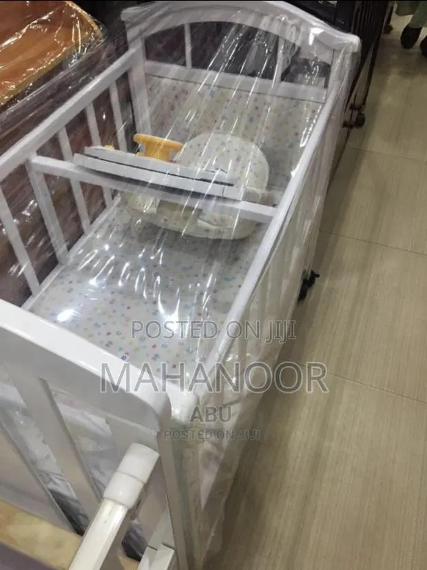 Brand New Baby Cot · Photo 1