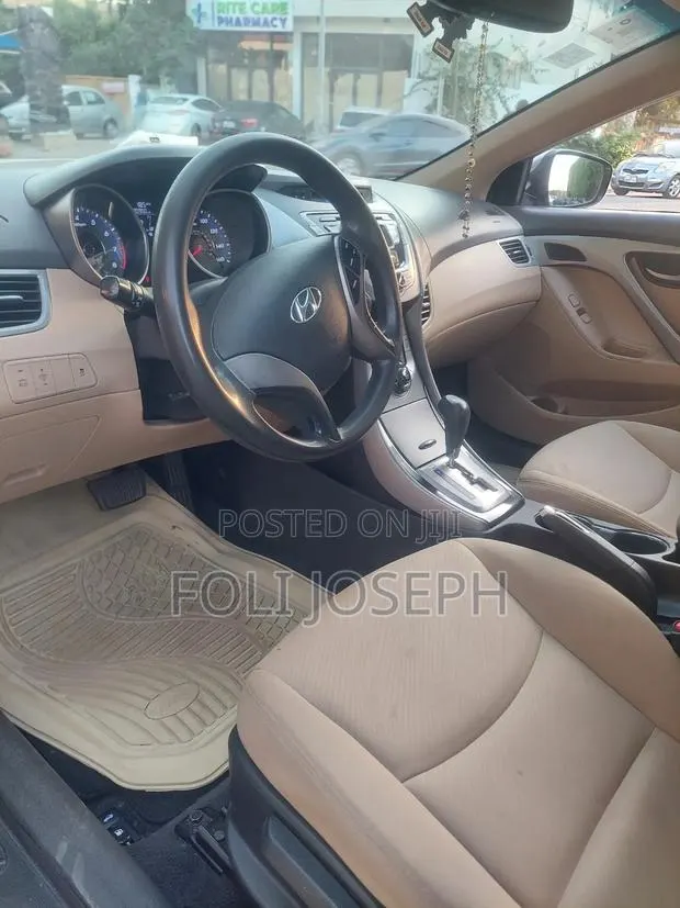 Hyundai Elantra GLS Sedan FWD (1.8L 4cyl 6A) 2013 Brown · Photo 1