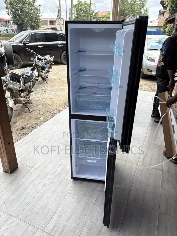 A Generous Storage Capacity Nasco Double Door Fridge Bottom Freezer · Photo 1