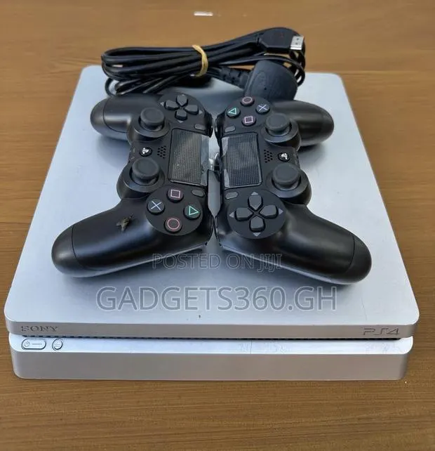 Sony PlayStation 4 Slim (1TB White + 15 Games) · Photo 1