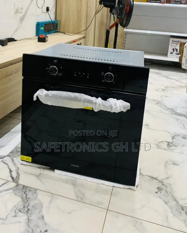 Authentic Sleek Black Tempered Kenwood Electric and Gas Oven · Photo 1