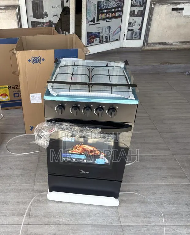 Choose Midea 4 Gas Burner With Oven(Black)Glass Door · Photo 1