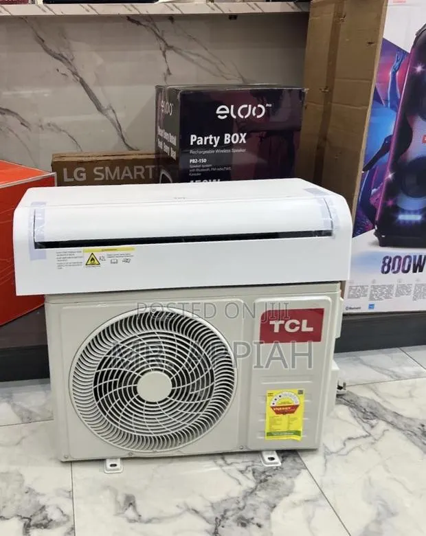 Highly Classic TCL 1.5hp Non Inverter Ac(White)Remote Control. · Photo 1