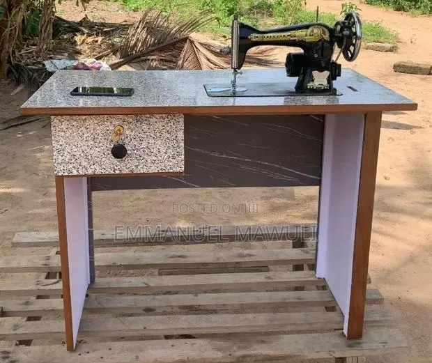 Mechanized Sewing Machine Desk. · Photo 1