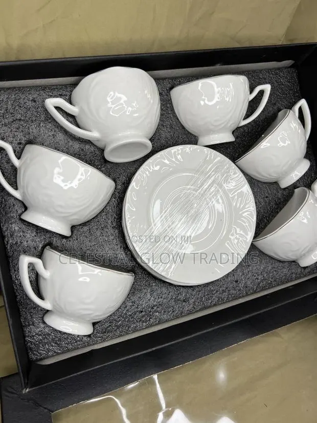 Elegant White Ceramic Tea Set With Gold Rim · Photo 1