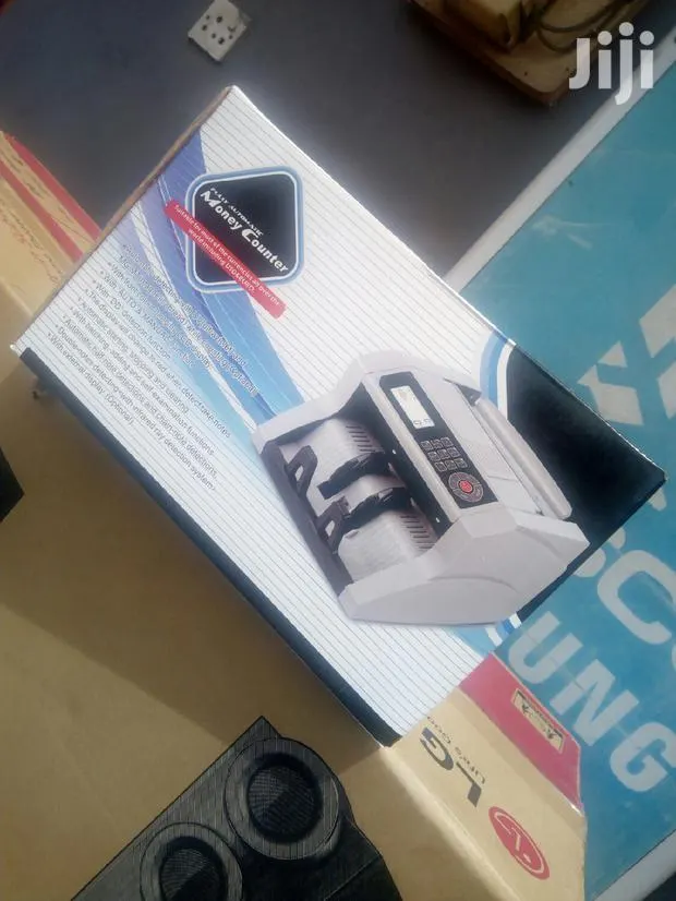 Portable Bill Counter Money Counting Machine Cash Banknote · Photo 1