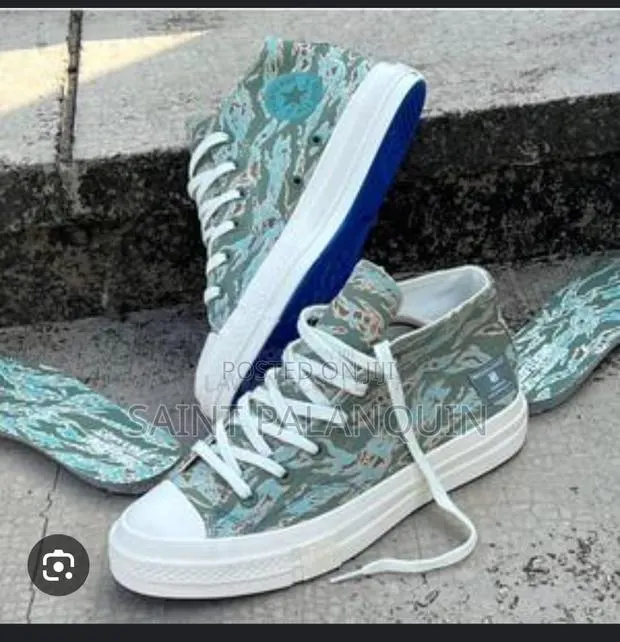 Converse X Undefeated Chuck 70 Mid · Photo 1