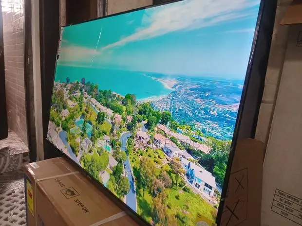 Sigma 55 Uhd Tv Aura, Tv That Fills Your Room. · Photo 1