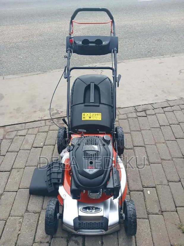 6.9hp C J Lawn Mower 166cc,/ at Caprice Bus Stop · Photo 1